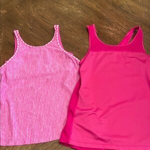 Two Nike tanks size L